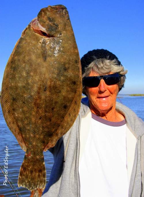  - Barbara-Singleton-of-Winnie-TX-fished-a-finger-mullet-to-catch-this-BIGGA-Flounder