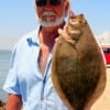 GW Martin of Grove OK nailed this 19inch flounder on finger mullet-