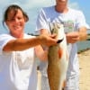 Woodville anglers Rhonda Lynn Gilchrist took her son John Scott fishing at Rollover catching his 1st ever redfish.