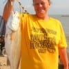 Patricia Halper of Leesburgh TX holds a nice red caught on finger mullet.
