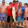 Bucky Crouthers and friends took this 35inch red while surf fishing.