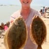 Patsy Bunyard of Tarkington, TX too these two nice flounder on live shad.