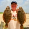 Rick Johnson of Woodville took these two nice flounder on finger mullet.