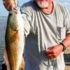 Sid Ingles of Gilchrist took this nice red on finger mullet.