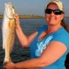 Kim Villemez of Beaumont caught this nice red on finger mullet.