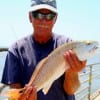 Tom Oliver of Gilchrist, TX nabbed this nice red on soft plastic.