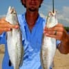 Tyler George of Liberty, TX nabbed these two nice specks on shad.