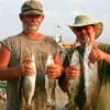 Fishin buds Don Watkins and Ted Beaty hit the pass early to catch a limit of specks on soft plastics.