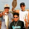 Fishin Buds Leonel and Isaaz Arandez w-Ronaldo Corona of Baytown caught these nice trout and flounder on live shrimp.