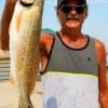 Dallas angler Henri Fontenot took this nice red caught on finger mullet.