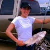 Ximena Viteri of Houston with a nice drum caught on finger mullet.
