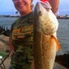 Sandie Fauss of Tyler, TX hefts this 26inch red caught at Rollover.