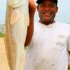 Harold Williams of Houston nabbed this 28inch red on finger mullet.