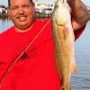 Philip Jameson of New Caney TX nabbed this nice red on finger mullet.