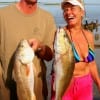 A happy couple the Rodgers of Tyler, TX fished shrimp for these nice reds.