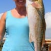 Becky Godfrey of League City, TX took this 24inch red on finger mullet.