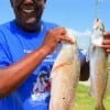 Bobie Ellis of Beaumont nabbed thuis nice red and trout on finger mullet.