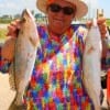 Poochie Walker of League City, TX nabbed these two nice trout on shad.