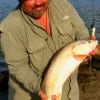 Todd Chapman of Pasadena, TX caught this 28inch red on cut mullet.