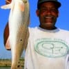 Harold Williams of Houston took this nice red fishing finger mullet.