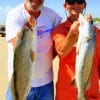 Fishin buds Greg Ryherd and Chris Willett of Woodville, TX took these two big trout on finger mullet.