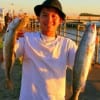 Khoa Ha of Houston night-fished for these nice trout using live shrimp.
