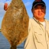 Working a Berkely Gulp, Houstonian Mike Chaing nailed this nice flounder for supper.