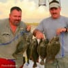 Fishin buds Todd Chapman and Mark Burden of Pasadena, TX gigged this nice stringer of flounder at night.