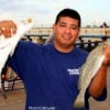 Robert Aguirrie of Houston boxed these two trout fishing live shrimp.
