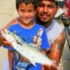 Dad and Son; Angel and Jose Tello of Alvin, TX took this nice spanish macerell from the cut fishing finger mullet.