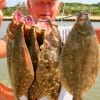 Frank Bunyard of Tarkington Prairrie, TX strung a limit of flounder fishing finger mullet.