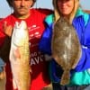 Bob and Patricia Kinney of San Leon, TX caught this nice flounder and red on finger mullet.