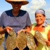 Ramon and Letitia Espinoza of Pasadena, TX boxed 4 out of 15 flounder they caught on finger mullet.