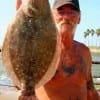 Tommy Bell of Rollover Pass took this 22inch Doormat flounder on finger mullet.