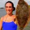 Ximena Salazar of Houston landed this nice flounder while fishing a soft plastic.