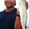 Ned Kennedy of Houston caught his very first speckled trout at Rollover Pass.