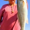 Rose Walwrath of Goodrich, TX landed this 24inch red on finger mullet.