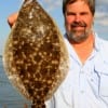 Charley McBride of Winnie, TX nabbed this nice flounder fishing with Berkley Gulp.