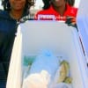 Sister anglers Naomi and Sarah Dancer of Houston fished shrimp to catch this box of Croaker.