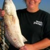 Lisa Yeager of Houston nabbed this 28 inch red fishing a finger mullet.