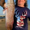 I just tossed a 40 incher back stated Lee Woodcock of Splendora, TX on showing off his 27 incher caught on shrimp.