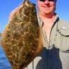 Clayton Davis of Pearland, TX fished a Norton soft plastic to catch this 18 inch flounder.