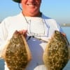 Two flounder for the table says this happy angler who took them on finger mullet.