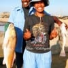 Father and Daughter; Shirley George of Monterey Peninsula, CA and dad Charles of Houston spent quality family time catching reds and drum at Rollover.