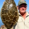 Frank Bunyard of Tarkington Prairrie, TX caught this nice flounder on finger mullet.