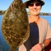Pat Bunyard of Tarkington Prairrie, TX tethered this chunky flounder fishing finger mullet.