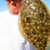 Cliff Wilson of Winnie, TX took this chunky flatfish on Berkley Gulp.