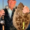 Dennis Frazier of Hampshire, TX nabbed this 20 inch flounder fishing a pearl white Berkley Gulp.