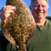 Ron Henry of Katy, TX fished a Berkley Gulp for this 17inch flounder.