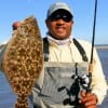 Houston angler Marion Jones wade-fished for this nice flounder caught on finger mullet.